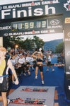 Eschenwald crosses the finish line at 11:59:13 achieving her sub 12-hour goal. Eschenwald crosses the finish line at 11:59:13 achieving her sub 12-hour goal.
