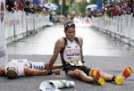 Chris Lieto and Craig Alexander collapse at the finish. Photo: Joe Jaszewski/Idaho Statesman Chris Lieto and Craig Alexander collapse at the finish. Photo: Joe Jaszewski/ Idaho Statesman