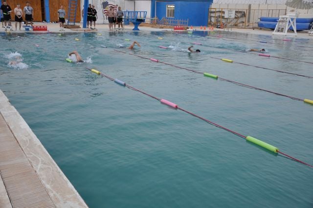 The swim took place in a restored Iraqi Air Force pool. Photo: Sgt. 1st Class Adam V. Shaw The swim took place in a restored Iraqi Air Force pool. Photo: Sgt. 1st Class Adam V. Shaw