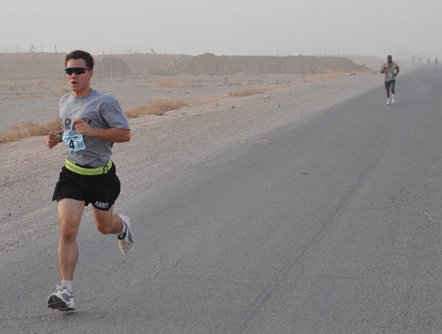 Iraq Triathlon Run 1st Lt. Marshall Kulp, 574th Quartermaster Co., 30th Combat Sustainment Support Battalion, 16th Sustainment Brigade, blows away his competition at the Bushmaster’s Triathlon at Contingency Operation Base Q-West, Iraq, June 28. Kulp finished with the fastest time of 53 minutes and seven seconds. The race consisted of a 400-meter swim, an 11K bike and a 3K run.