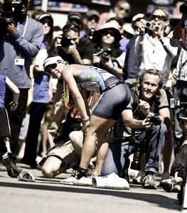 mirindacarfraefinishline Carfrae will debut her K-Swiss gear at this weekend's Ironman 70.3 California. Photo: John Segesta