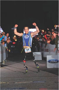rudyIMAZ Garcia-Tolson was greeted by an enthusiastic crowd at the finish line in Arizona. Photo: Rich Cruse