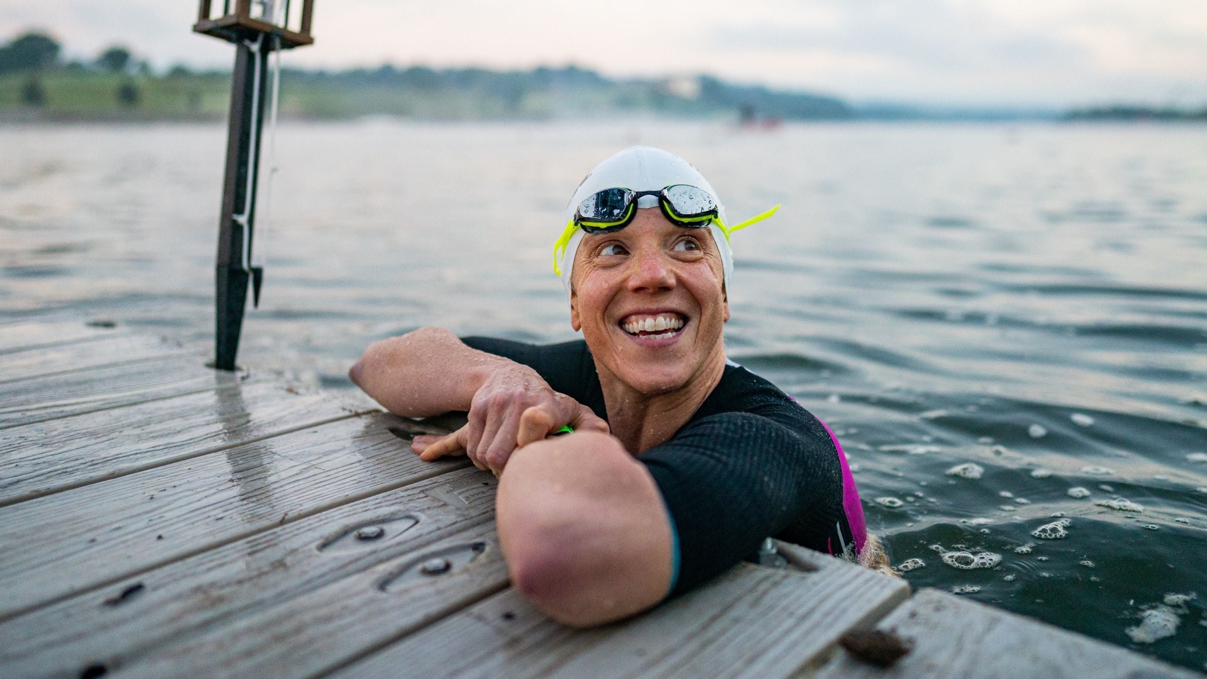 A triathlete is happy while training on a super simple ironman training plan