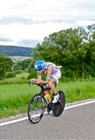 Andreas pressed hard on the bike