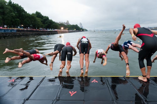 The pro men jump into the Hudson River to kick off the 11th Annual New York City Triathlon. Photo: Kris Mendoza