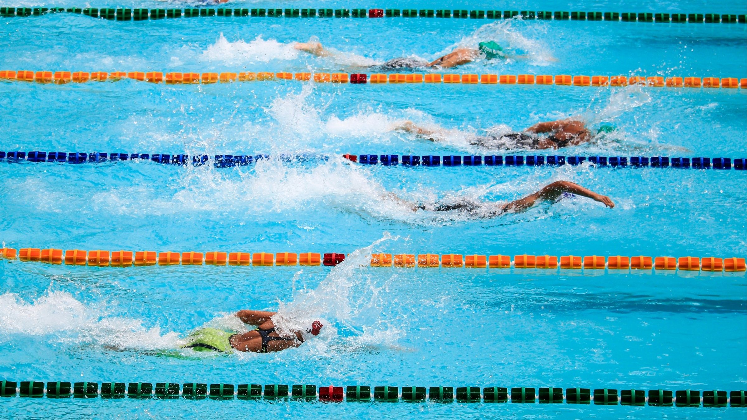 A pool with a group of swimmers completing a Weekend Swim Workout.