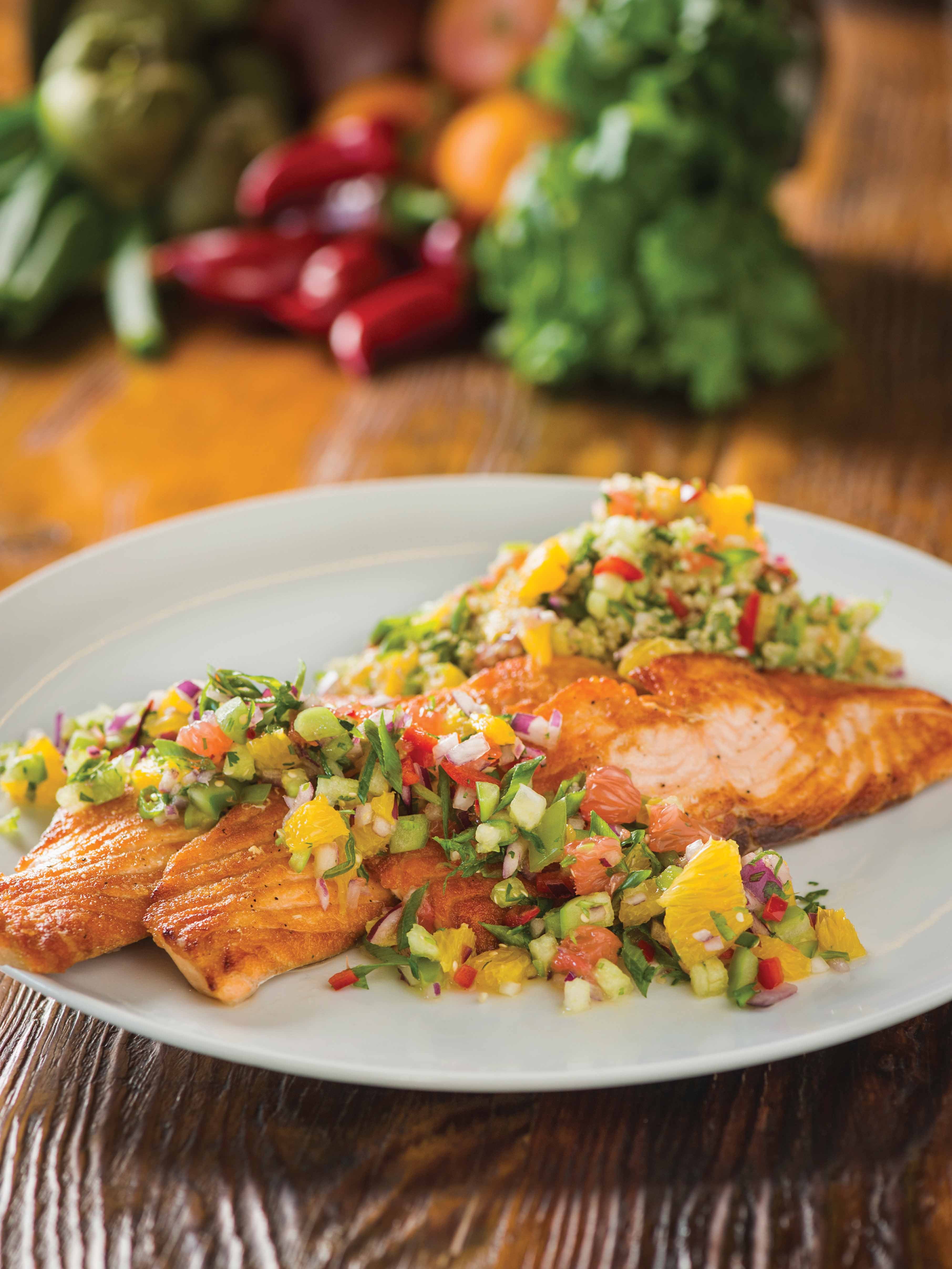 Salmon with quinoa and citrus-tomatillo salsa. Photo: Erik Isakson