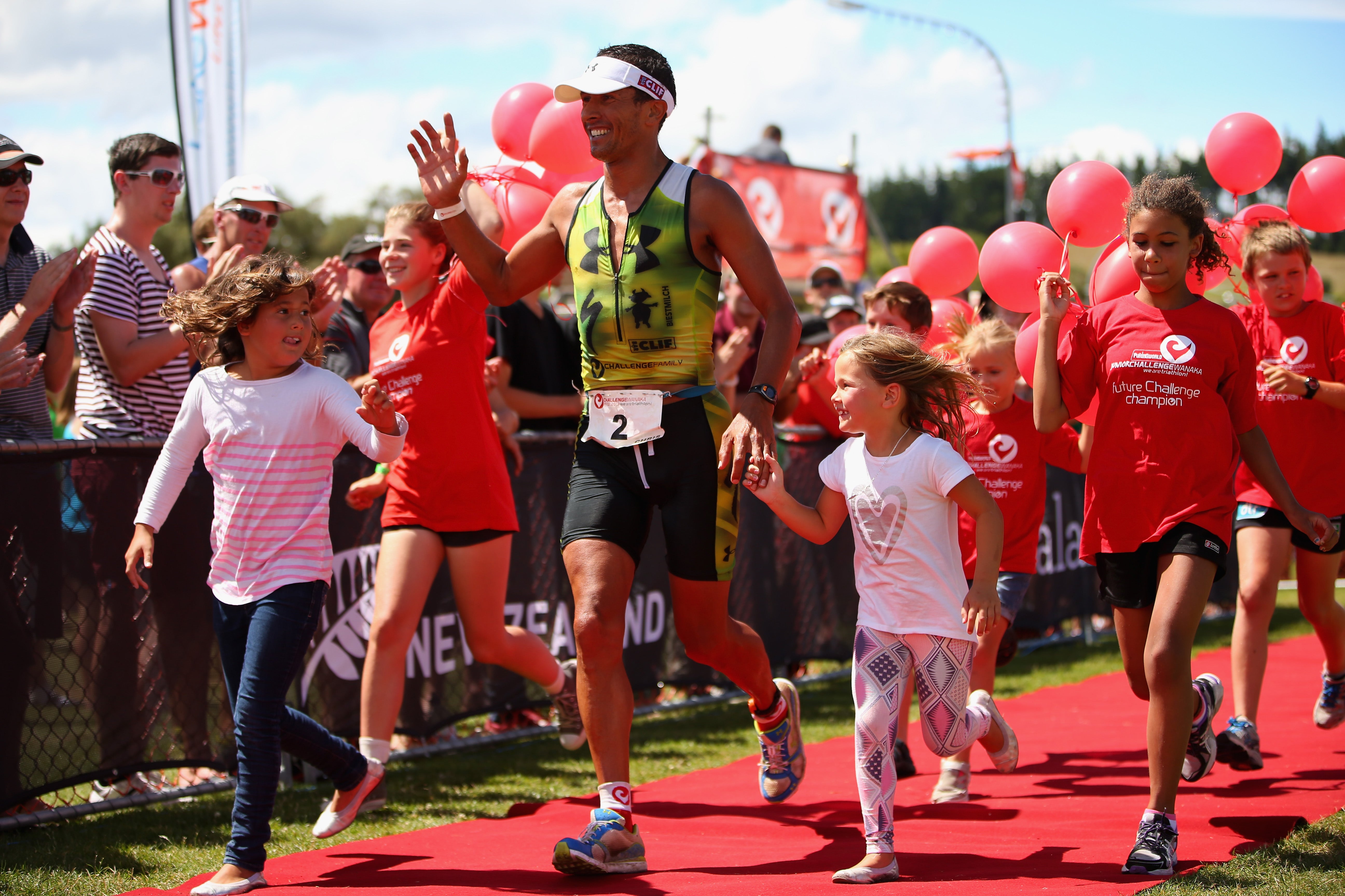 Macca at the finish line of the 2013 Challenge Wanaka triathlon. Photo: Getty Images