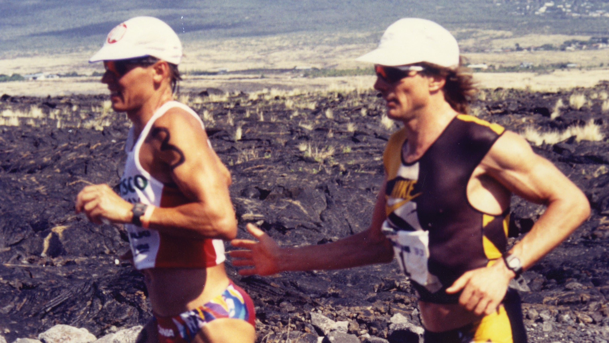 Matt Allen passes Pauli Kiuru at the 1993 Ironman World Championship.