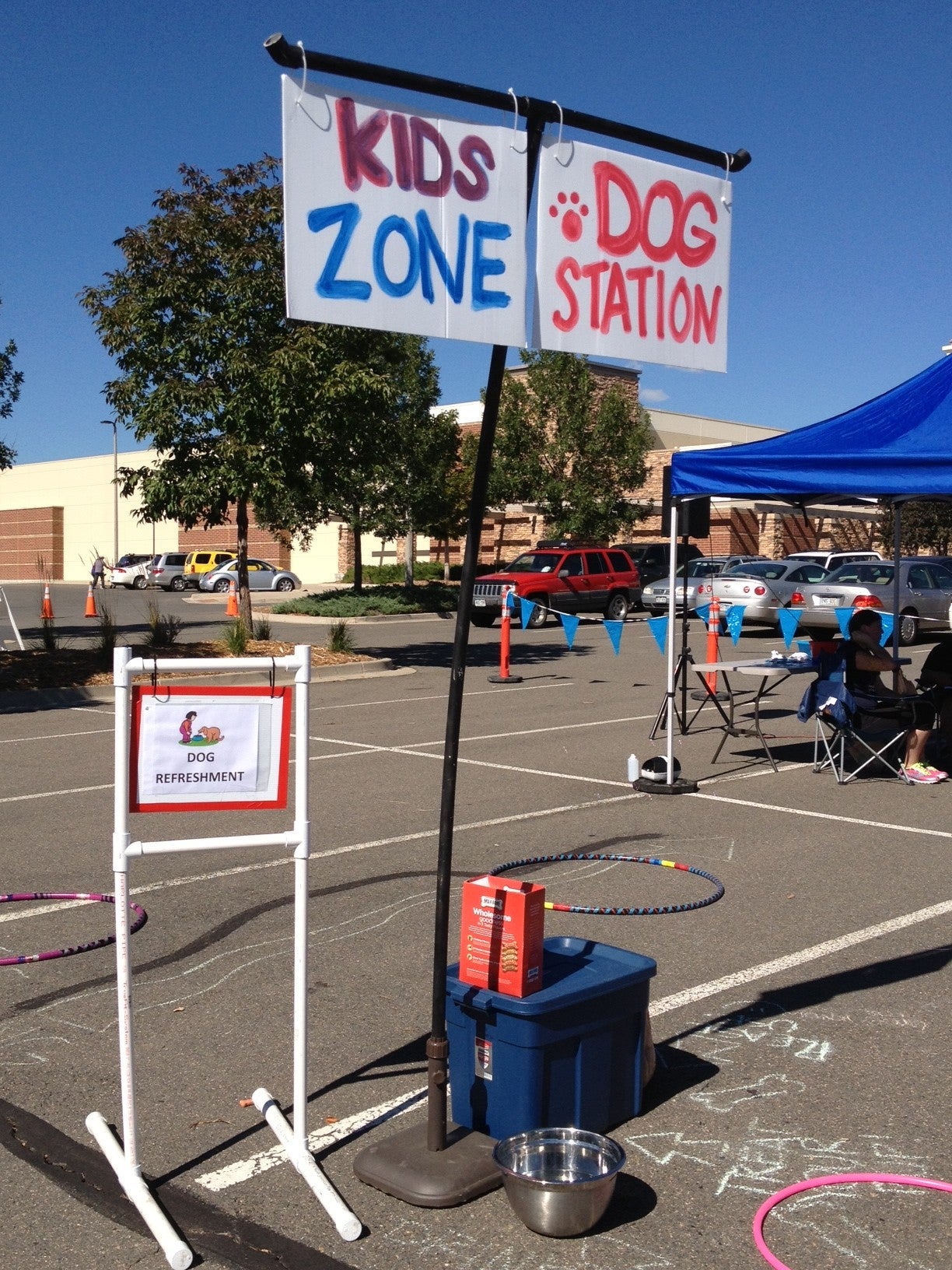 The race featured a dog refreshment station wherein canines in attendance enjoyed cool water and complimentary Milk-Bone biscuits.