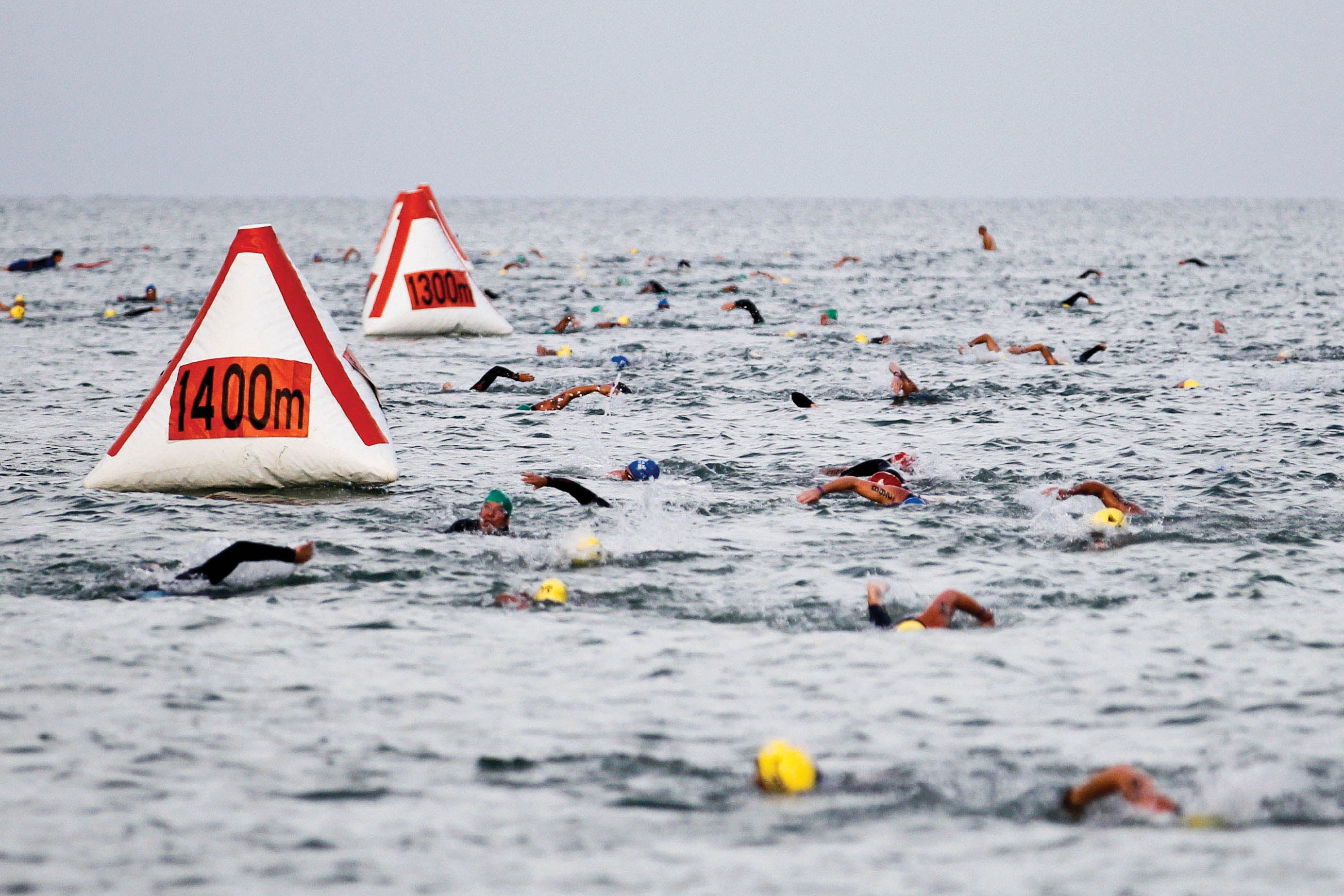 Large, bright numbered buoys at the TriRock Series races help keep swimmers on course and chart their progress, and they improve the safety teams’ communications. Photo: Eve Edelheit