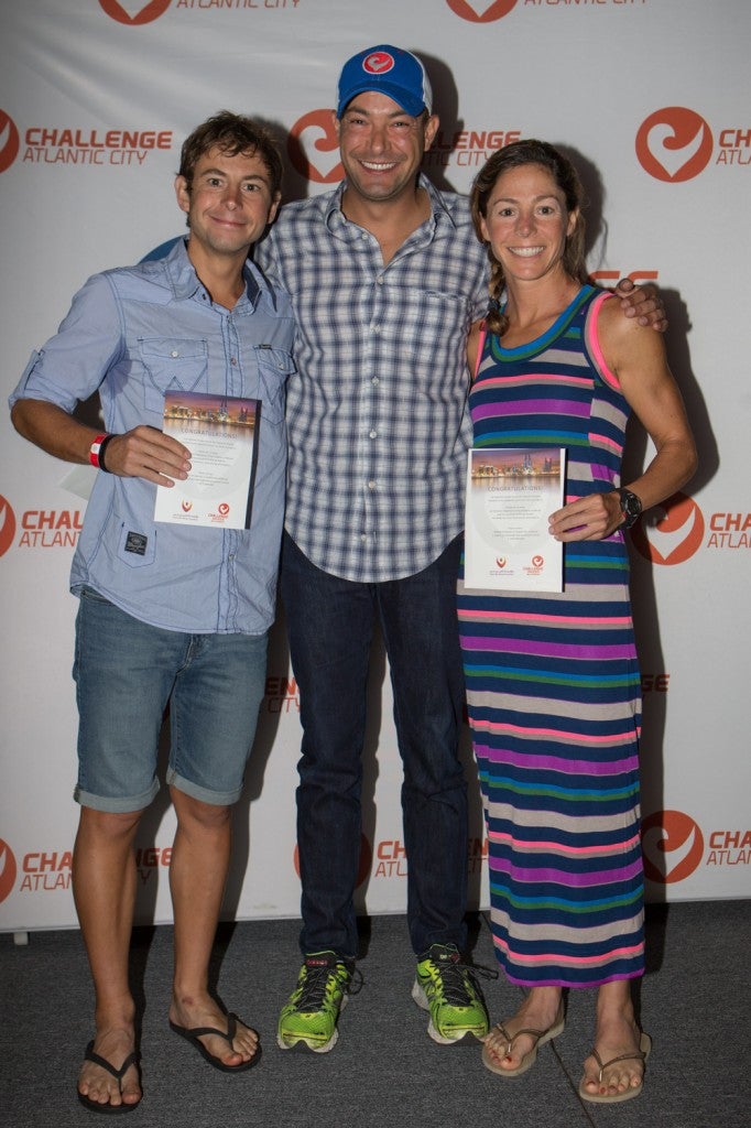 Challenge Atlantic City winners, Fredrik Croneborg and Laurel Wassner accepting their Challenge Bahrain Royal Package certificates with Challenge Family CEO, Felix Walchshöfer. Photo: Larry Rosa