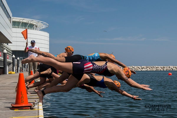 The elites dive in for the 2014 super sprint race. Photo: Paul Phillips/Competitive Image/@Compimagephoto