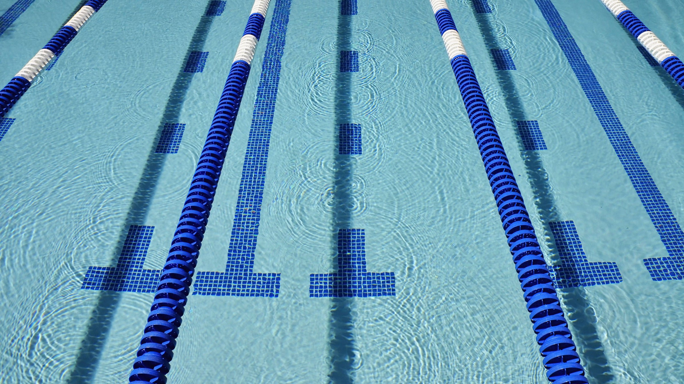 Photo of a pool ready for a triathlete to complete a Weekend Swim Workout with options for drills and adjustments.