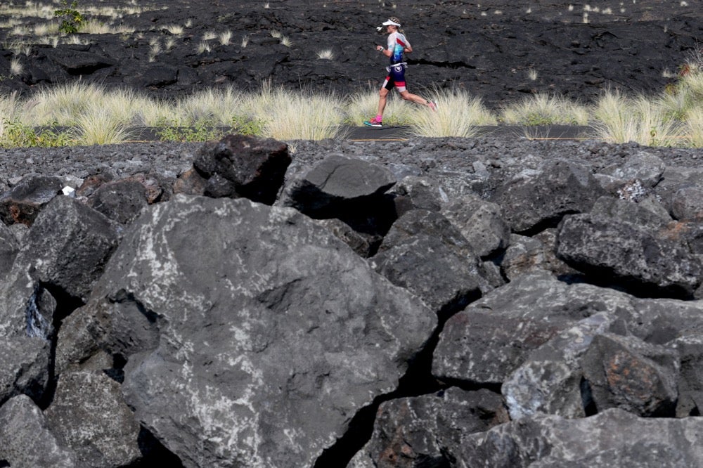 Ironman World Championship rookie Lucy Charles runs solo along the Queen Ka'ahumanu Highway. Photo by Tom Pennington/Getty Images for Ironman