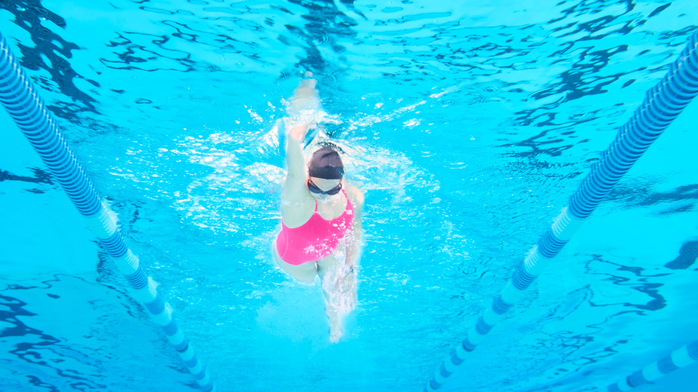 Focus on the basics of proper swim form, breathing and more with this One-Hour Workout.