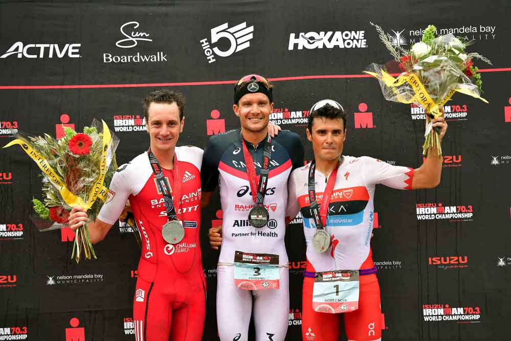 Three of the greatest triathletes of all time made up the podium. Photo: Donald Miralle / Getty Images for Ironman