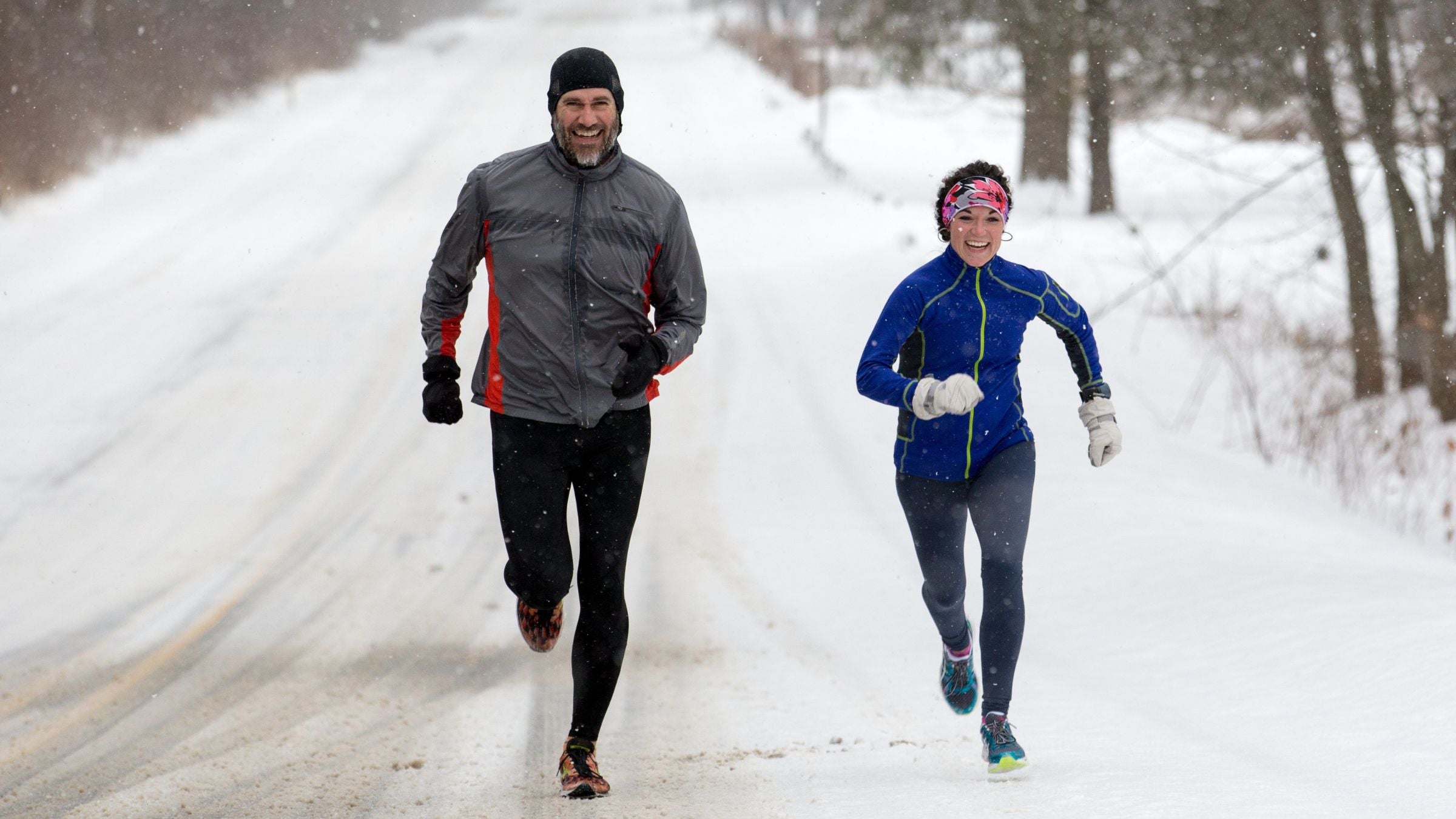 Runners do a Tempo Fartlek run workout in a winter landscape
