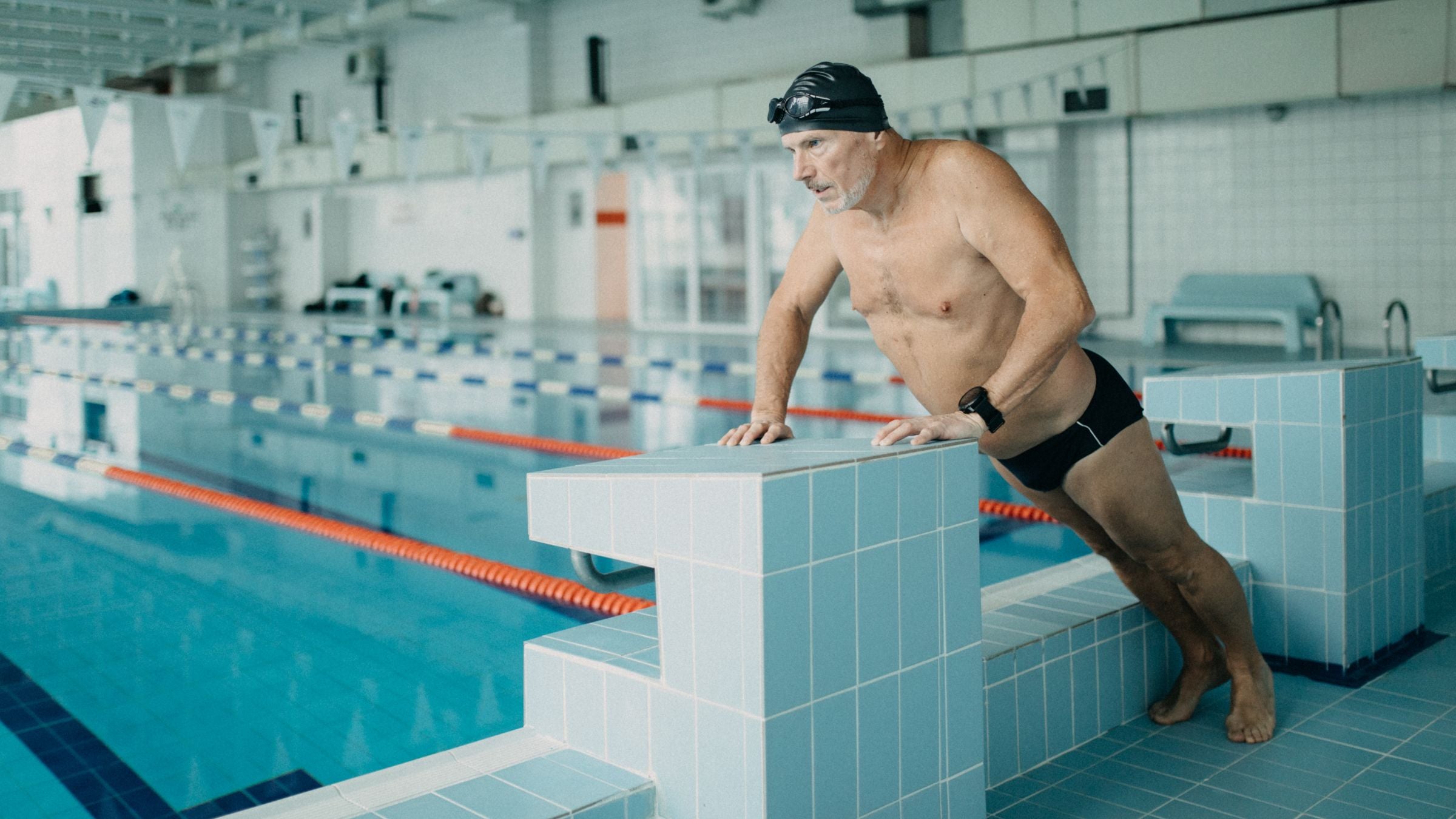 A man does a Swim and Strength Workout