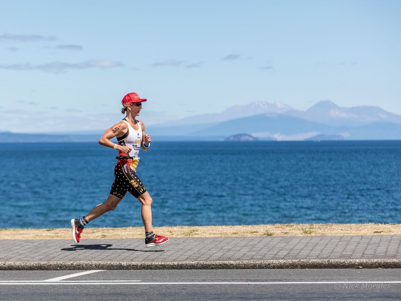 Meredith Kessler running along Lake Taupo. Photo: Nick Morales