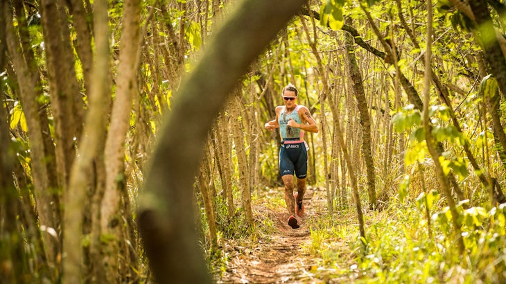 An athlete runs during an off-road triathon XTERRA