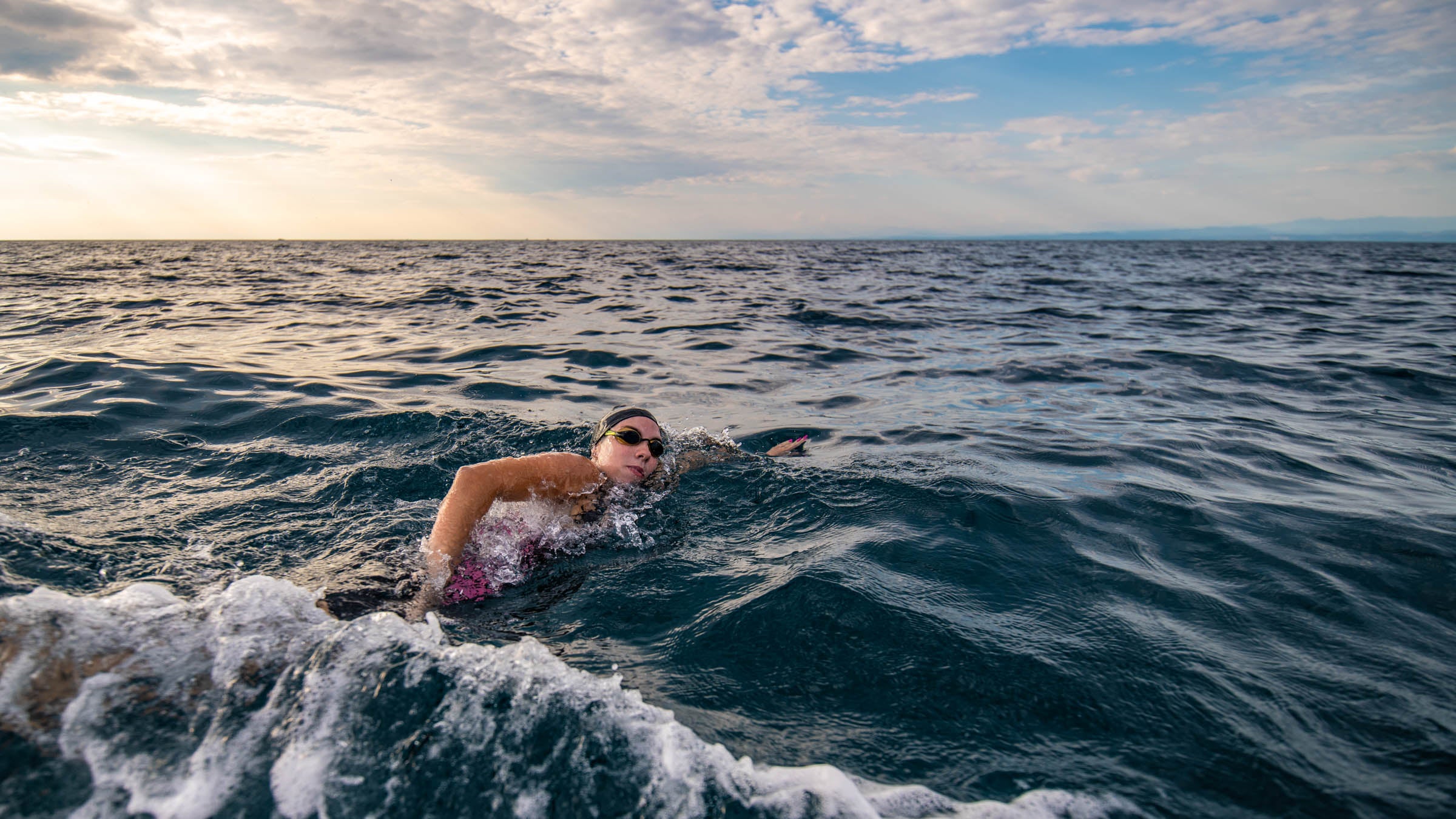 Female swimming in open water