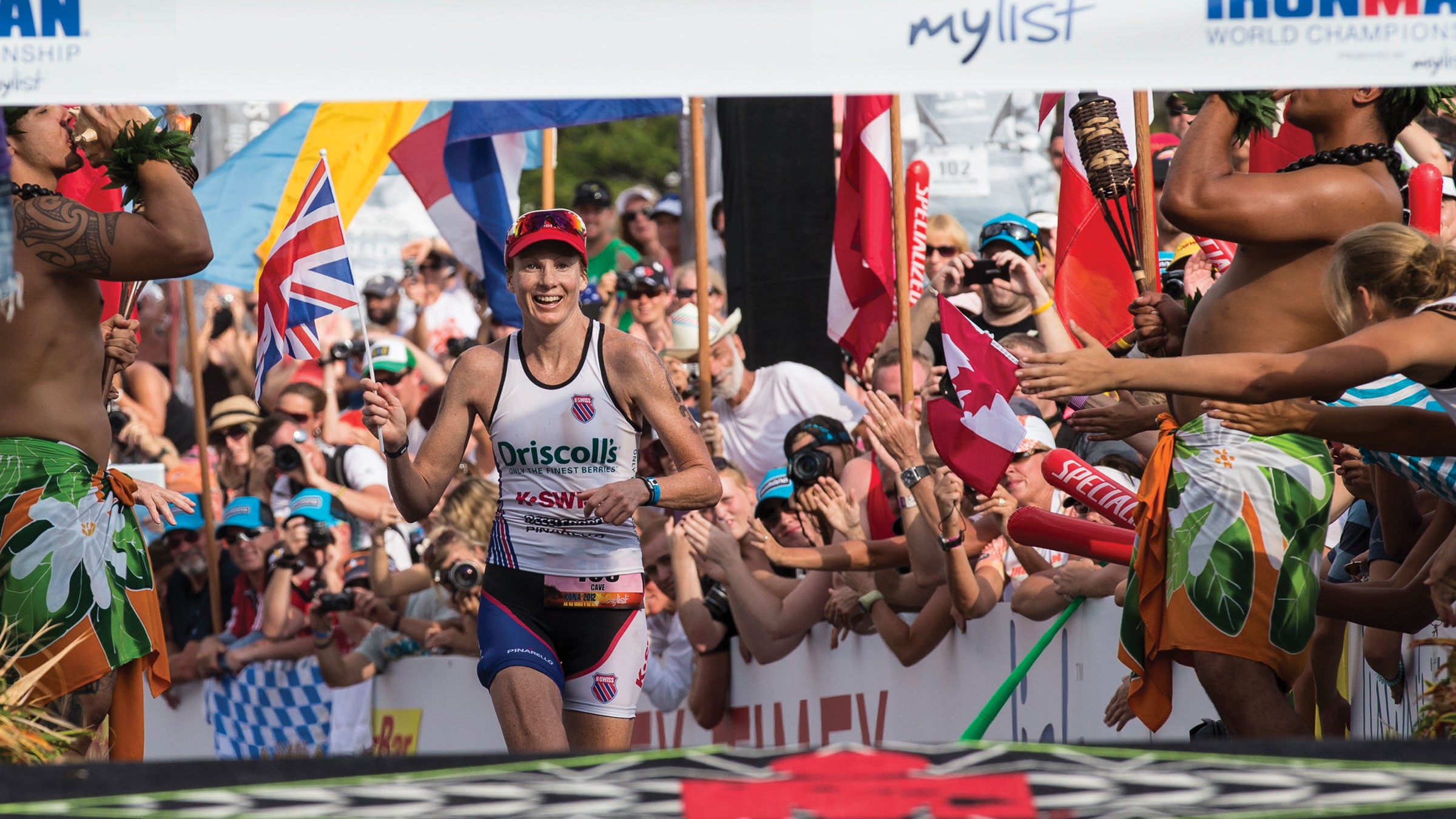 Cave crosses the line at the 2012 Ironman World Championship.