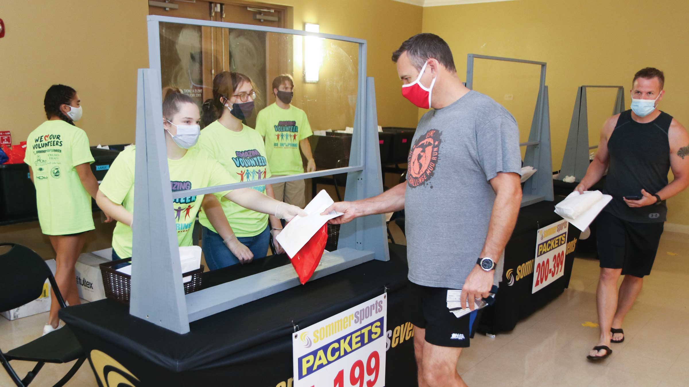 Packet pickup looks a little different when checking in for races during the pandemic.