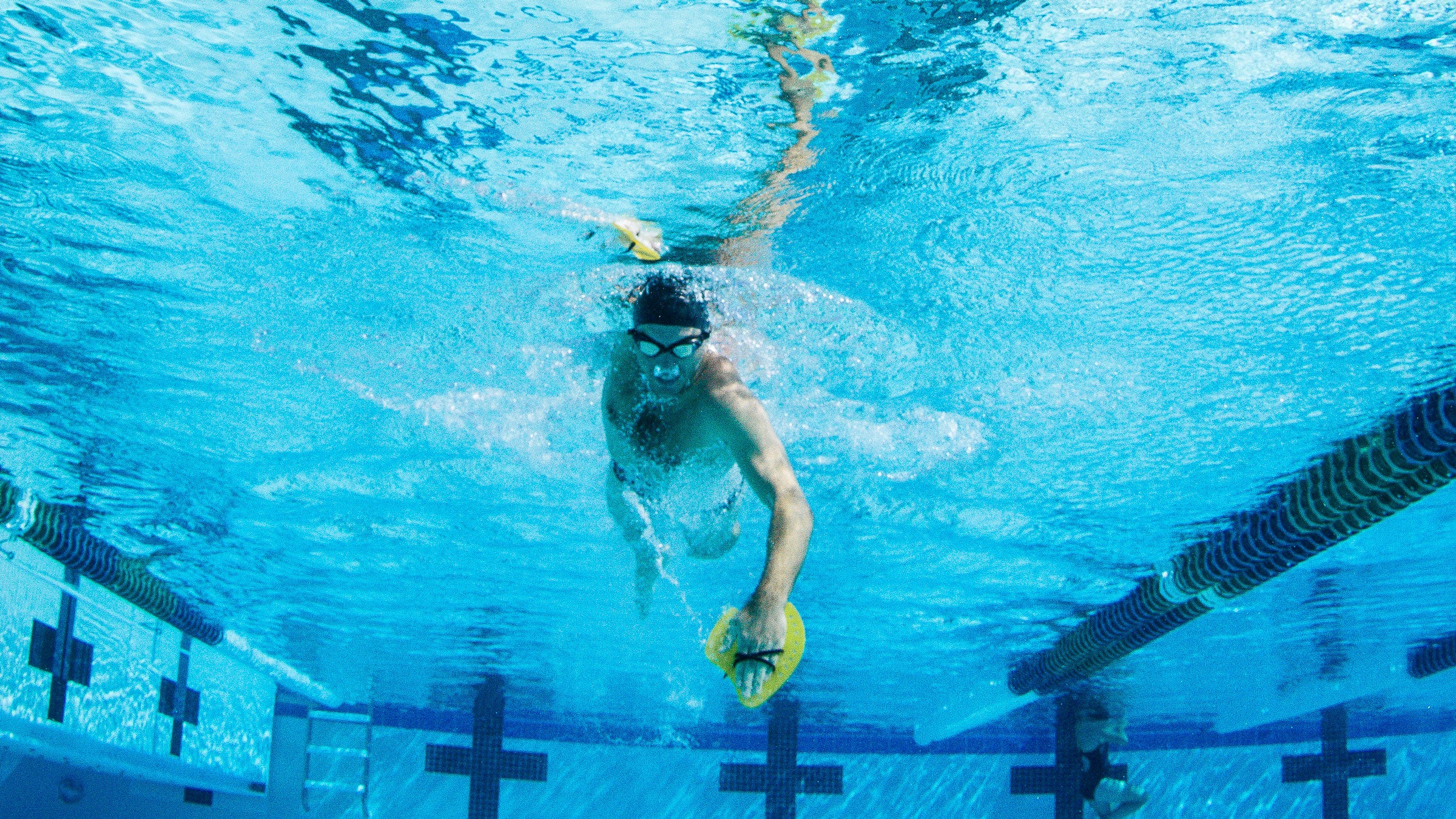 An athlete completes their off-season endurance swim.