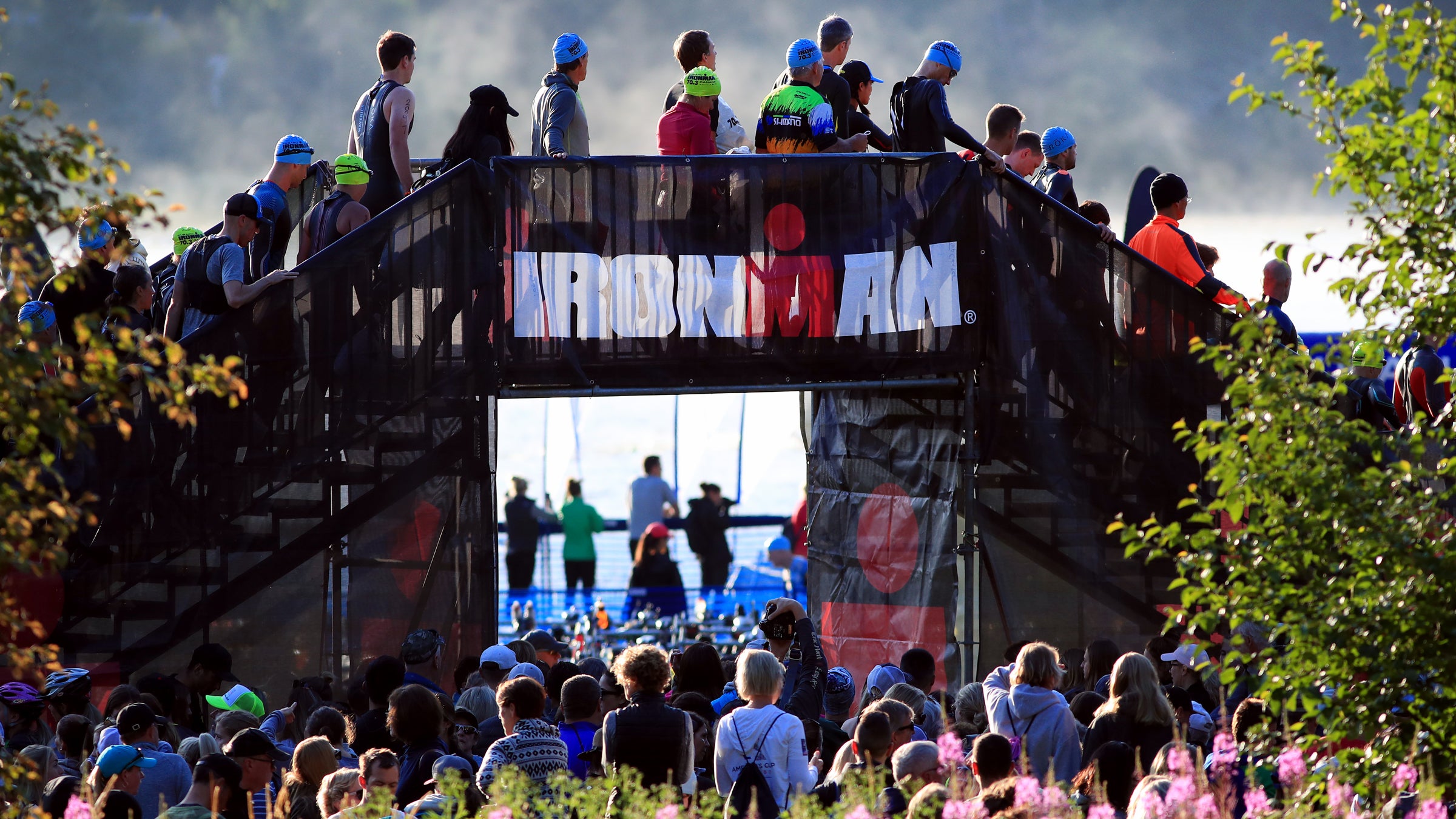Athletes line up for the start of an Ironman event.