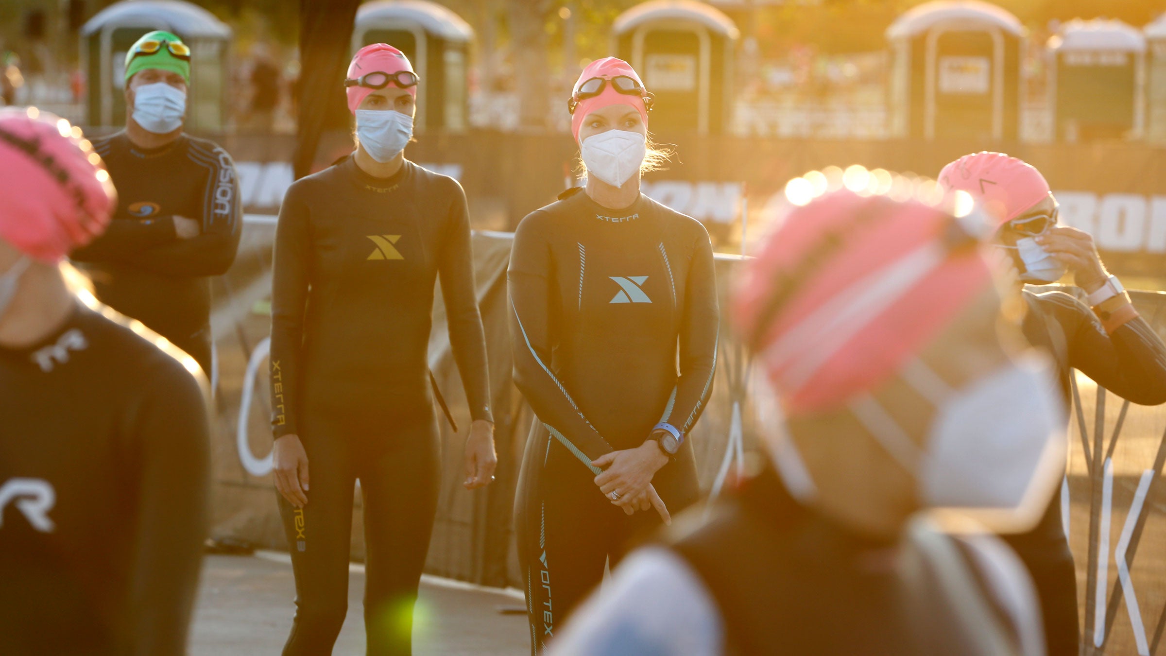 Athletes line up before Ironman 70.3 Arizona. Is it safe to have triathlons during Covid?