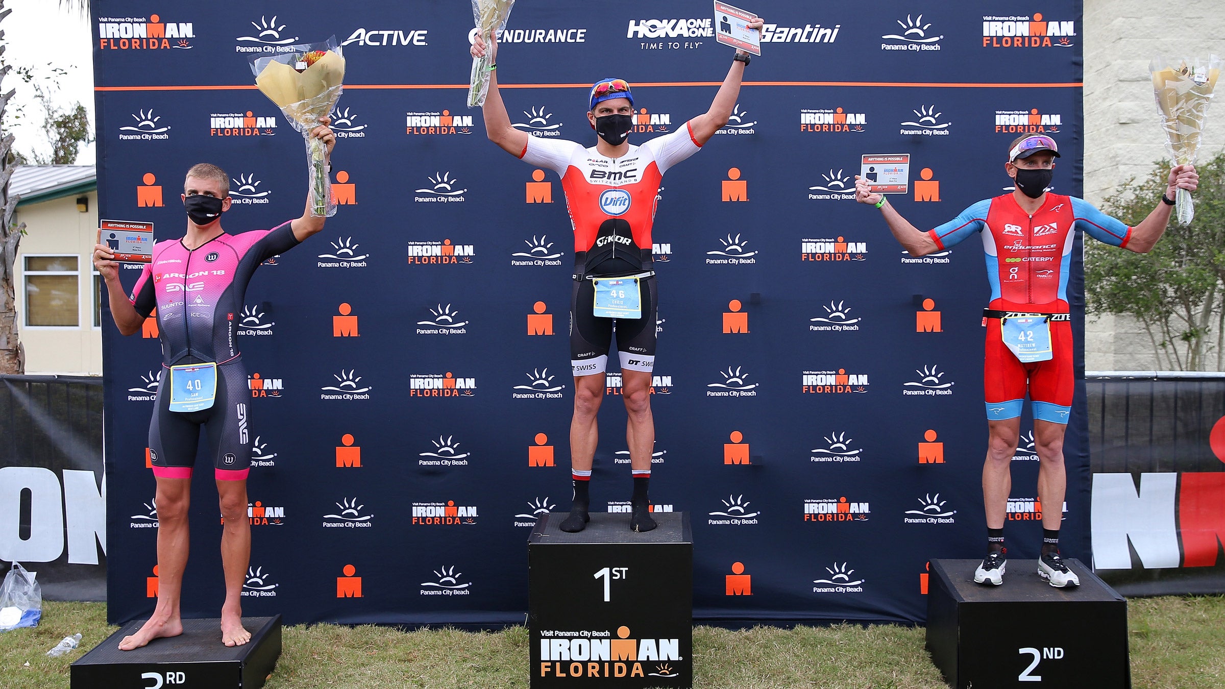 Athletes on the podium at Ironman Florida, one of the few events in the U.S. to go on as planned.