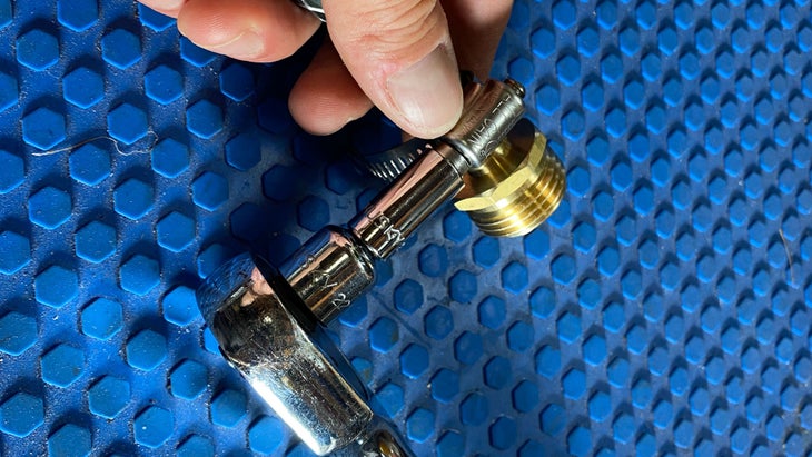 Portable shower hose clamp