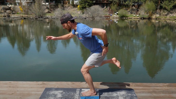 Man in a single leg squat