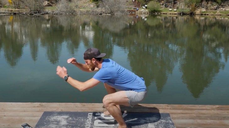 Man at the bottom of a jump squat