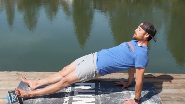 Man in a reverse plank