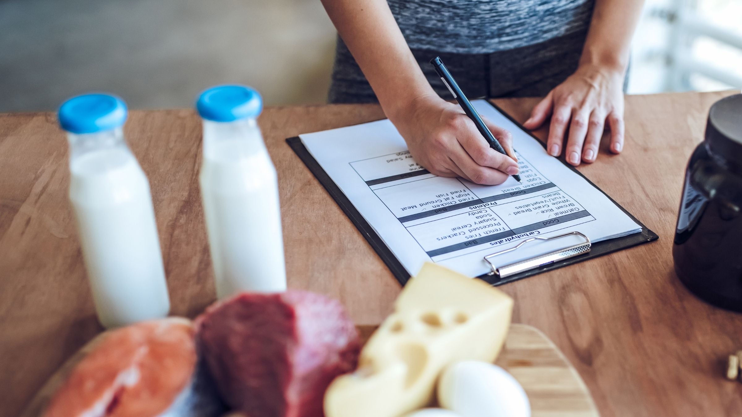 A triathlete writes out her race week nutrition plan, so she knows what to eat the week before a race.