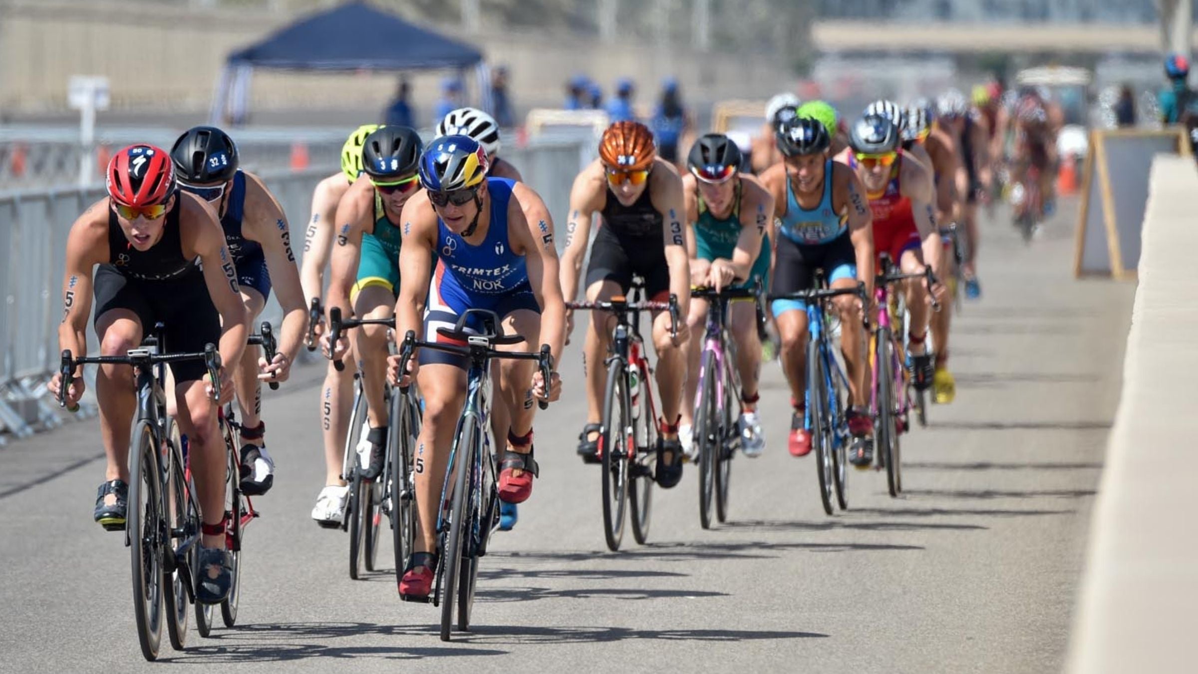 Athletes race while spectators watch at WTS Abu Dhabi