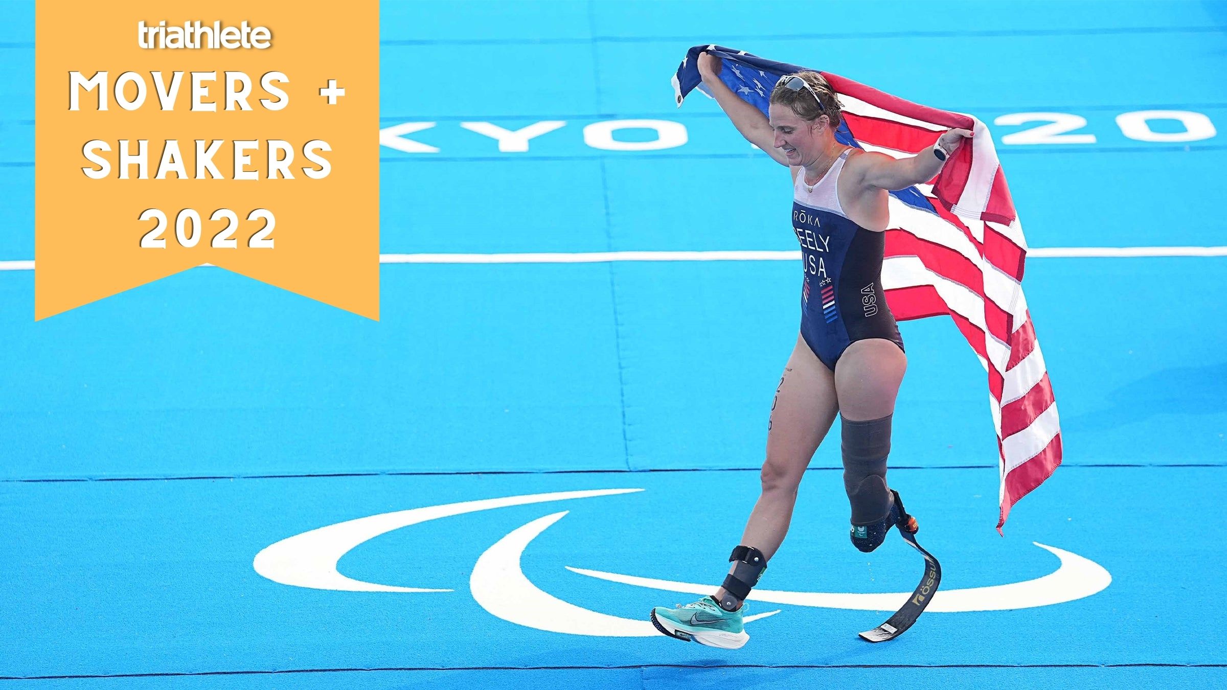 Allysa Seely holds an American flag after winning gold at the Paralympic games.