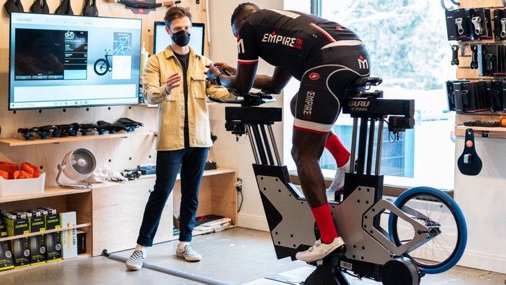 A triathlete gets measured for the right tri bike size.
