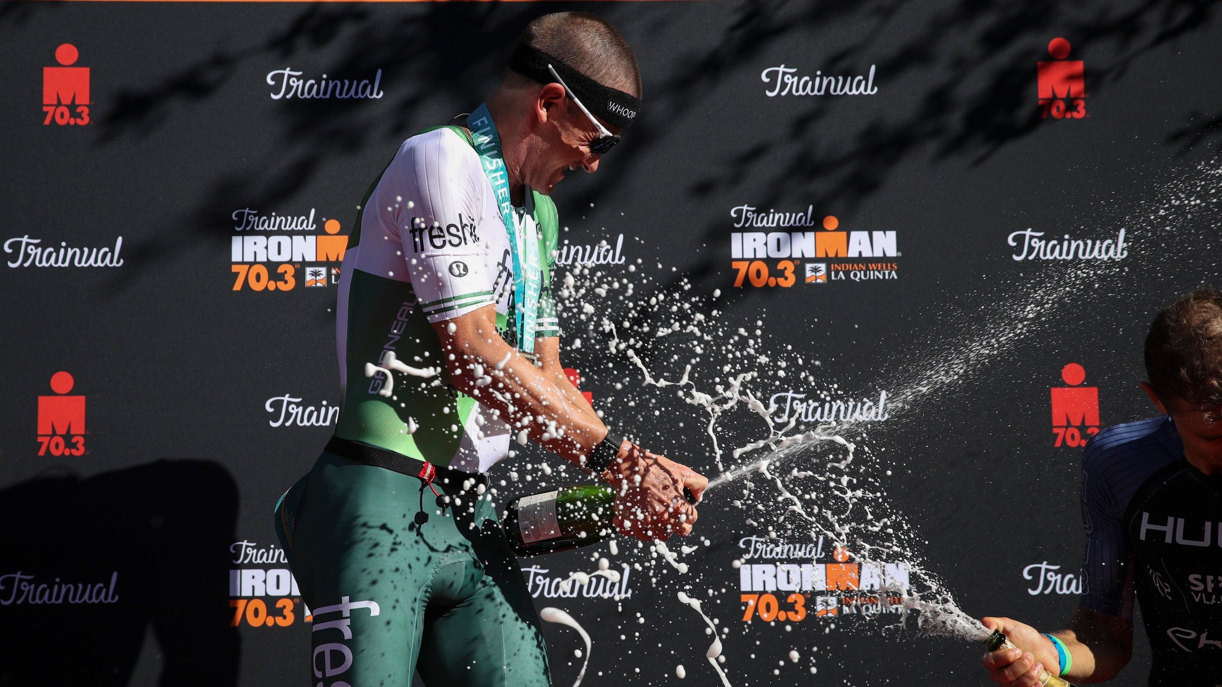 Lionel Sanders celebrates at Indian Wells 70.3