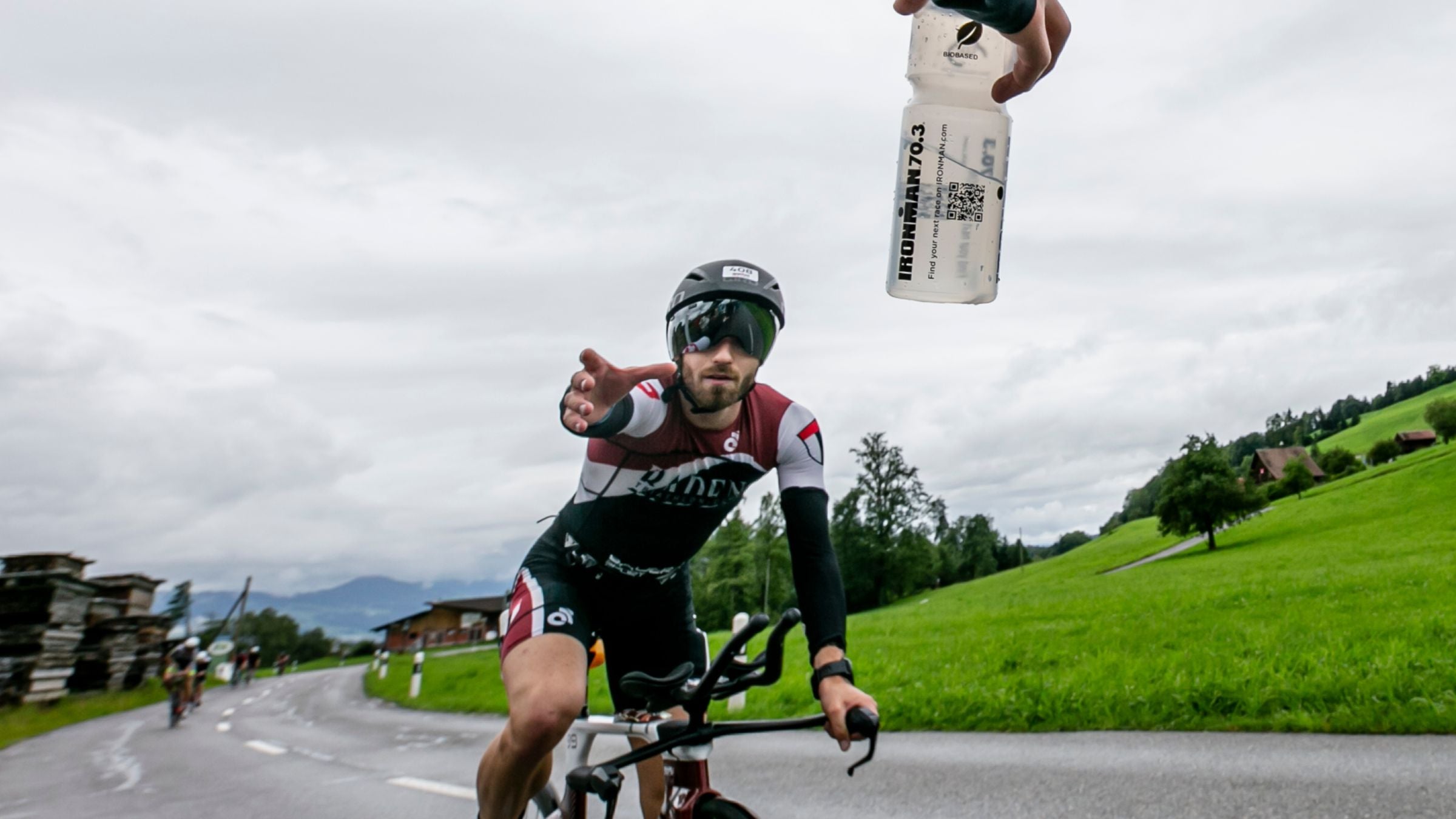 A triathlon race hands out water bottles for hyponatremia
