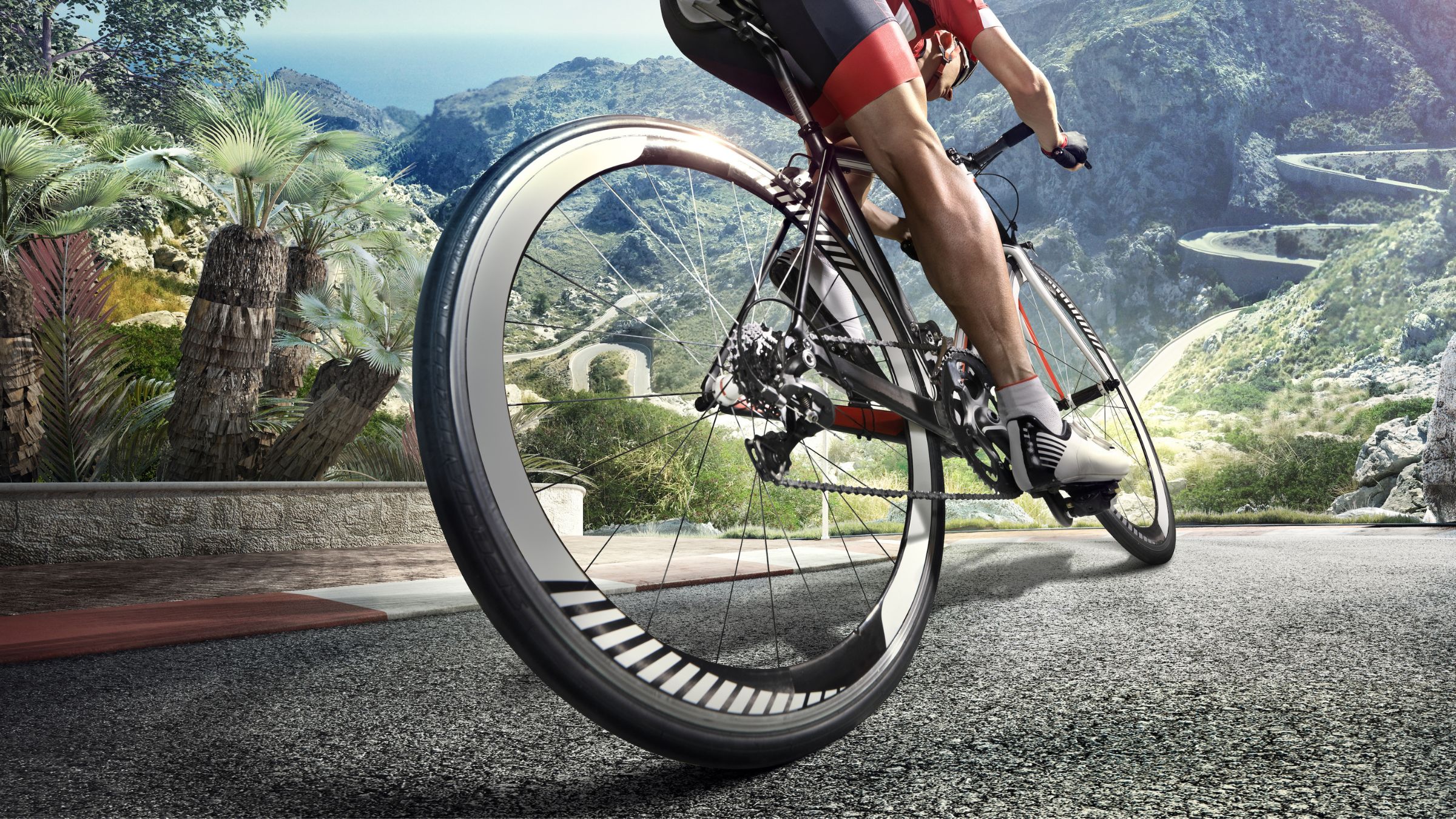 a triathlete rides 28mm tires