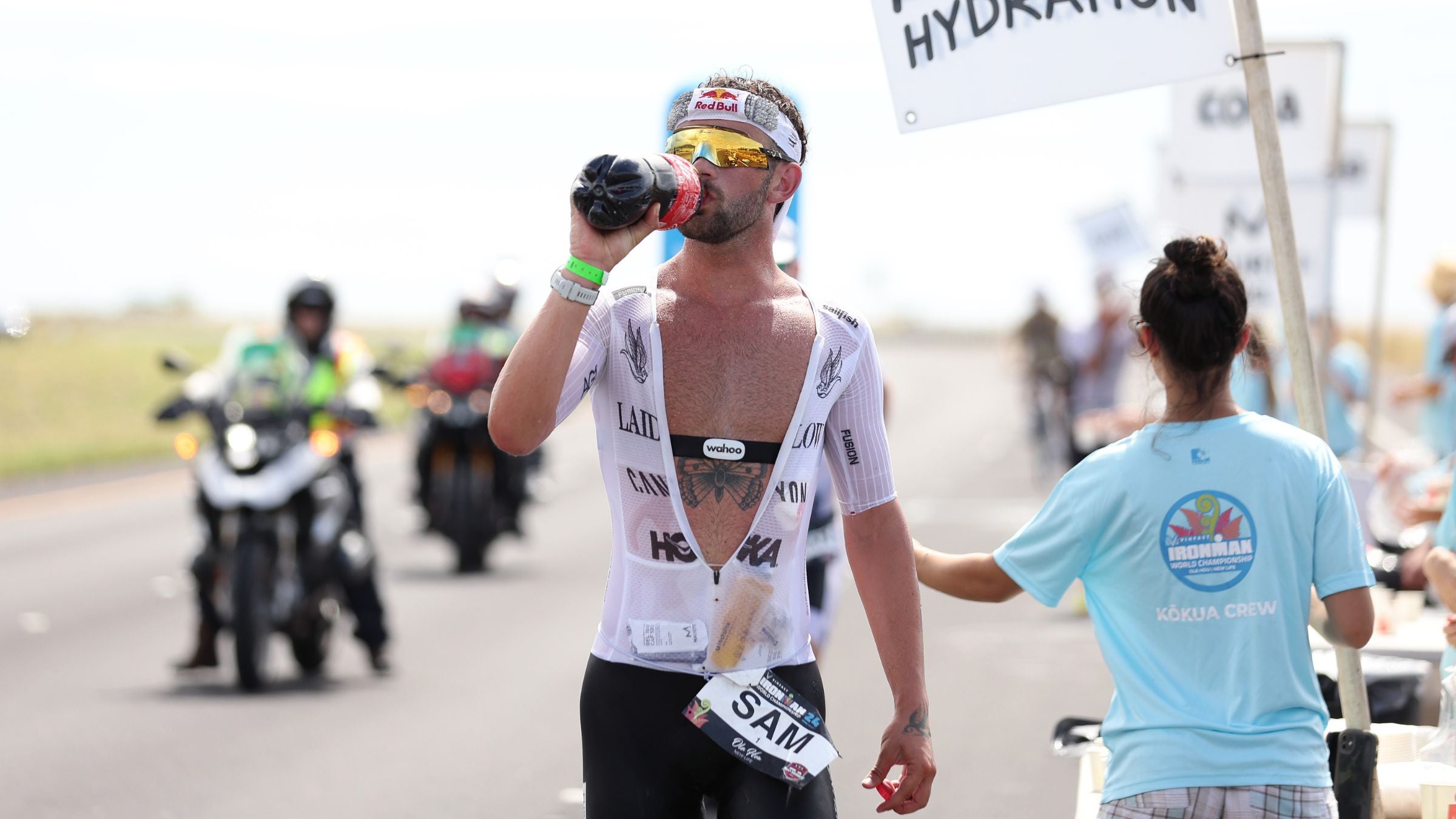 When should you drink cola (Coke) during an Ironman marathon? Coach Lauren Antonucci explains.