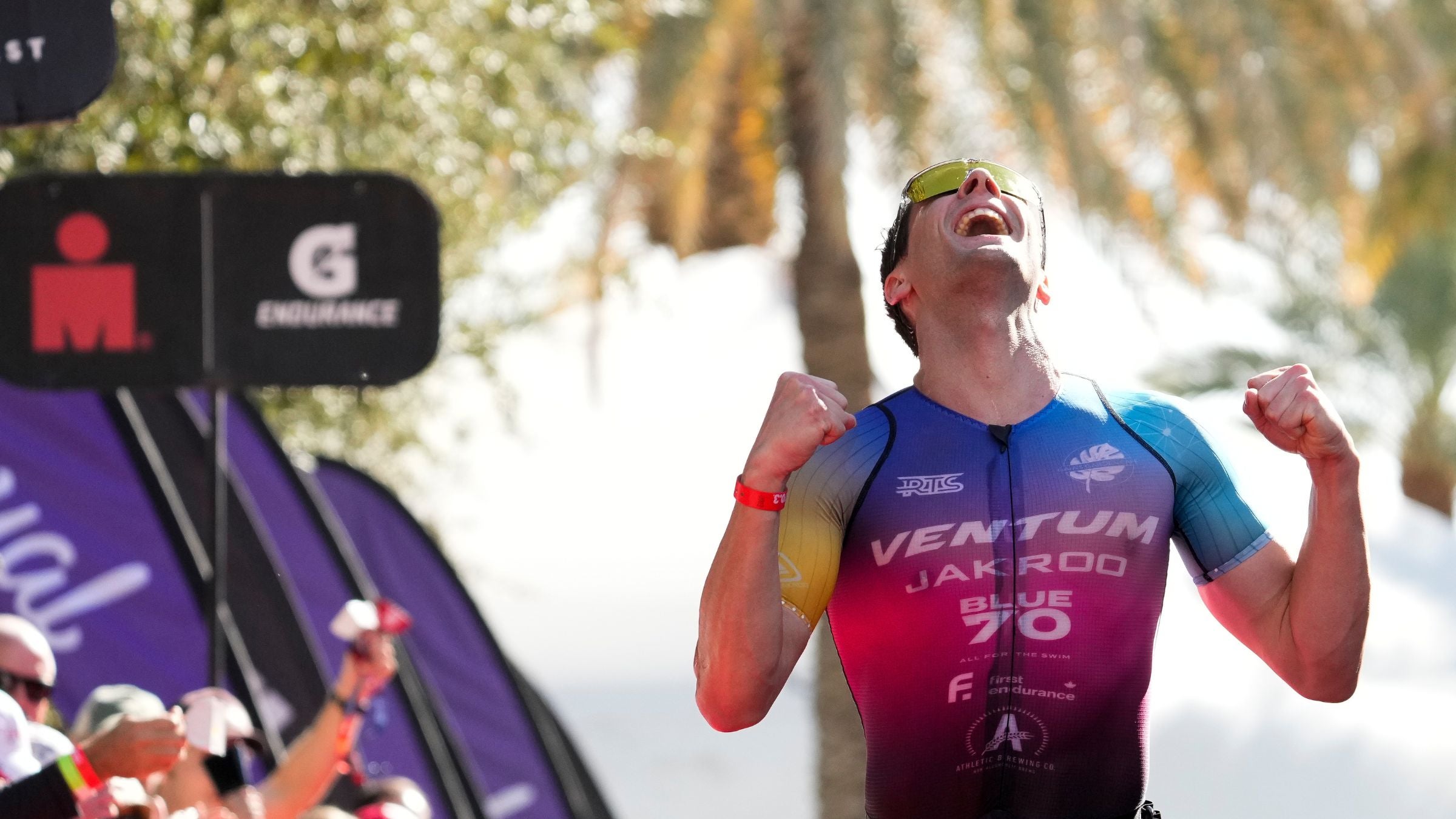 Jackson Laundry celebrates as he crosses the finish line of his second race in the same weekend.