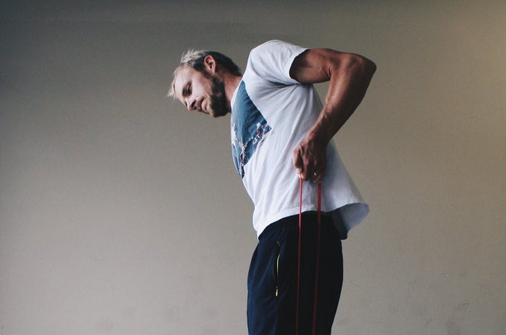 Ben Kanute does mobility drills for triathletes