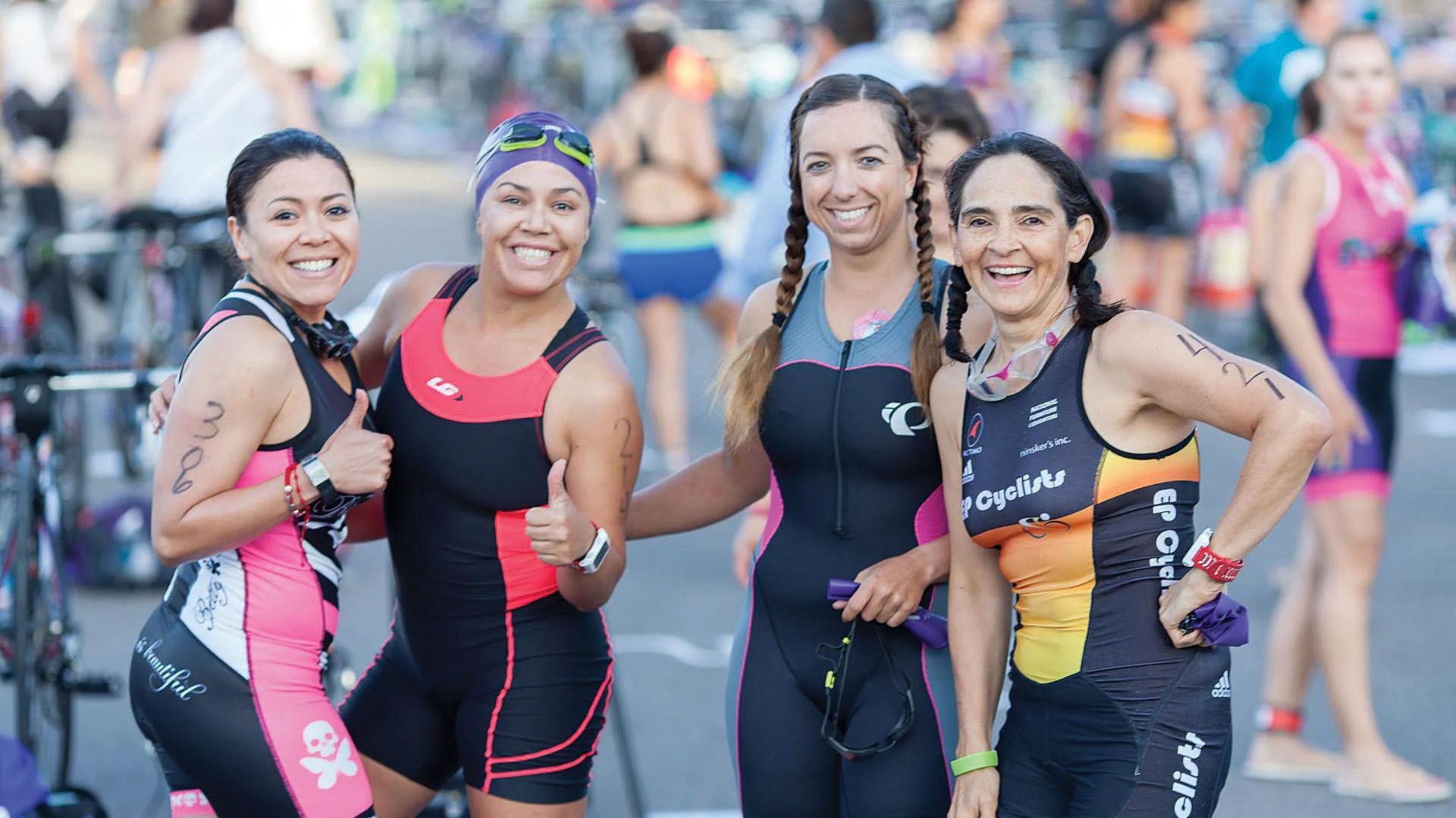 Athletes smile before racing a women only triathlon