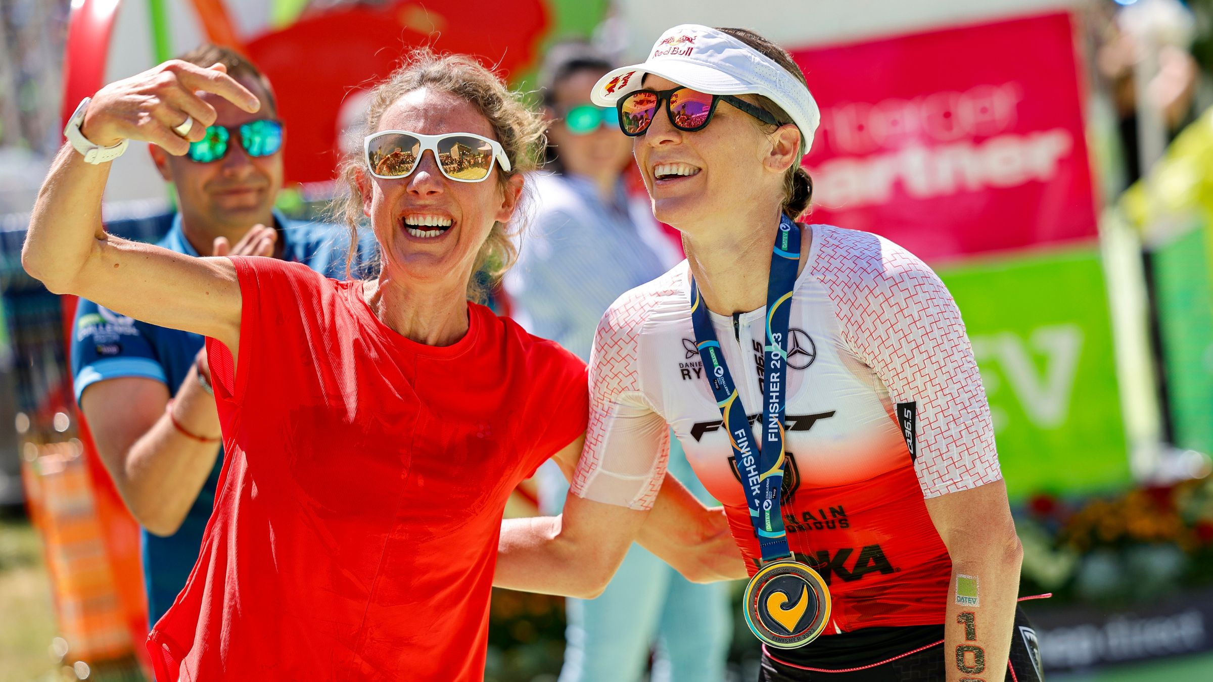 Chrissie Wellington (R) and Daniela Ryf are all smiles after Ryf broke Wellington's world record at Challenge Roth 2023.