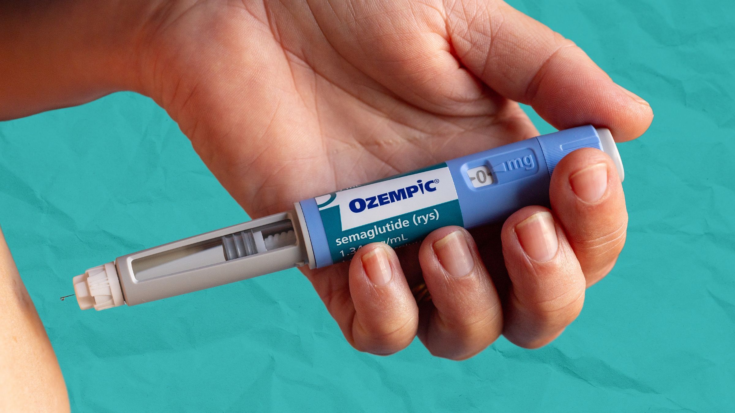 A triathlete preps an injection of Ozempic, which is now on the list of the World Anti-Doping Agency's Monitoring Program.